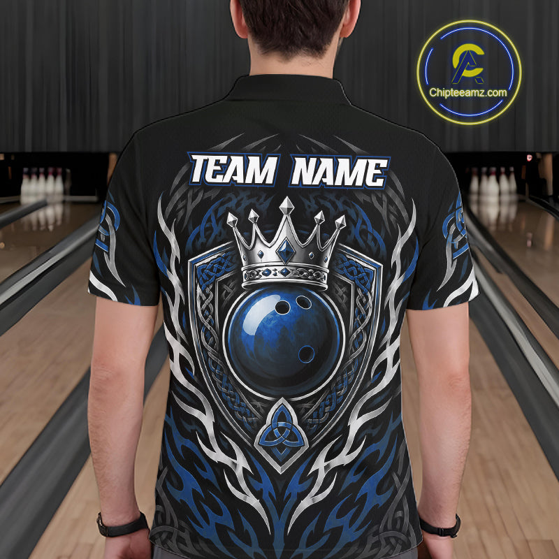 A man viewed from behind wearing a black short-sleeve bowling shirt with a large graphic on the back. The shirt features a blue bowling ball, a silver crown, shield, and tribal-style blue and white flame patterns.