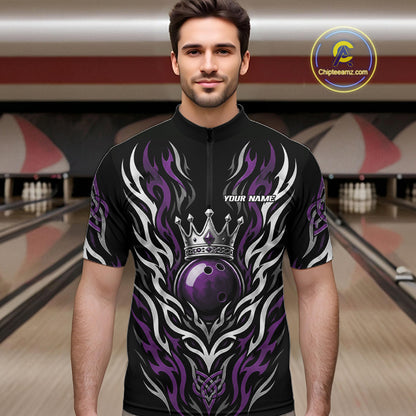A man wearing a black short-sleeve quarter zip bowling jersey with a purple and silver tribal flame design, a crown graphic, and a purple bowling ball motif. 