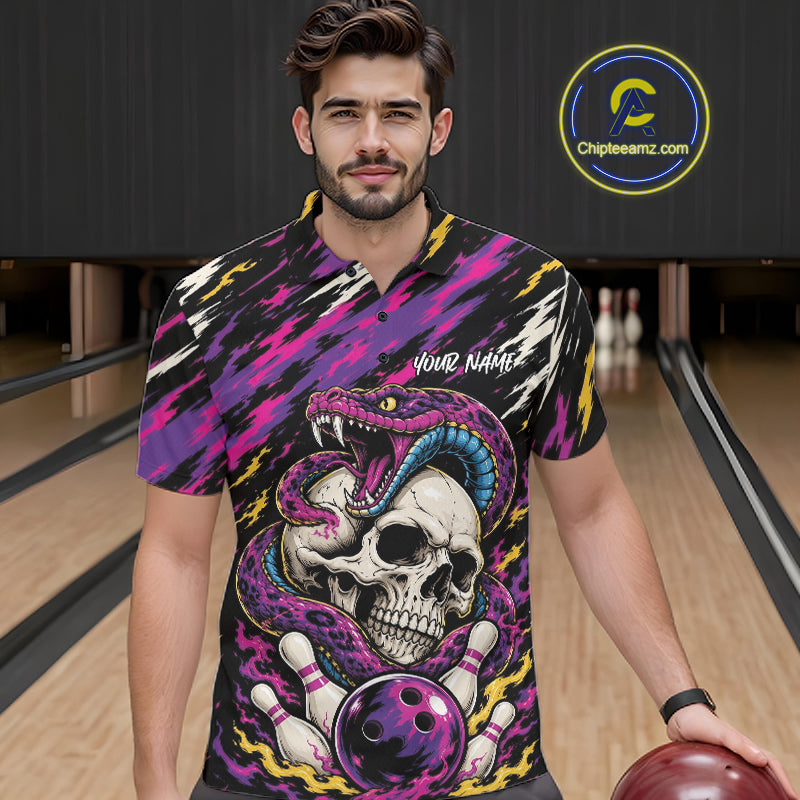 A man wearing a short-sleeve polo shirt shirt with a bold graphic print featuring a skull, snake, bowling pins, and bowling ball, set against a bowling alley background.