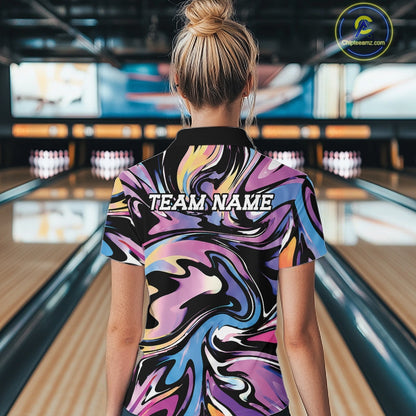 Person wearing a colorful bowling shirt with 'TEAM NAME' text in a bowling alley.