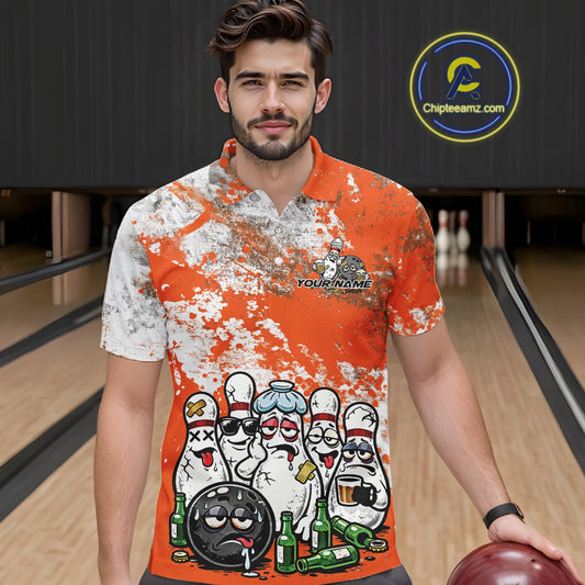 Front view of a male model in a bowling lane wearing an orange and white grunge splatter polo shirt with humorous cartoon bowling pins and beer bottle graphics.