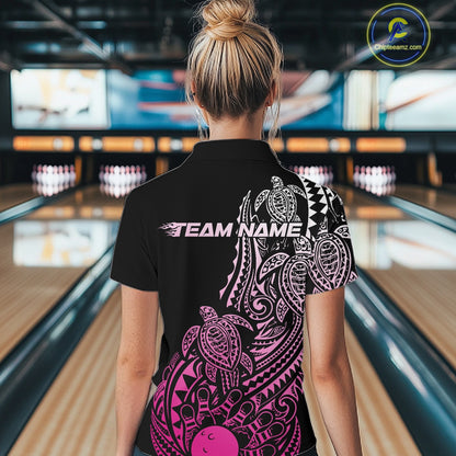 Back view of a female model in a black and pink bowling quarter-zip shirt displaying tribal-inspired bowling artwork.