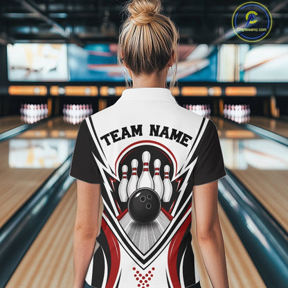 Back view of a female model wearing a white, black, and red bowling quarter zip shirt featuring bowling ball and pins artwork at a bowling lane.