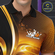 Load image into Gallery viewer, Close-up of the left chest on a bowling polo shirt featuring glossy gold and black bowling ball and pins artwork.