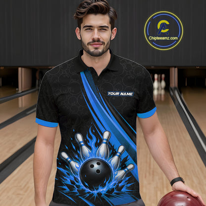 A man wearing a custom black and blue bowling-themed short-sleeve polo shirt with a graphic of bowling pins and a bowling ball, standing in a bowling alley.