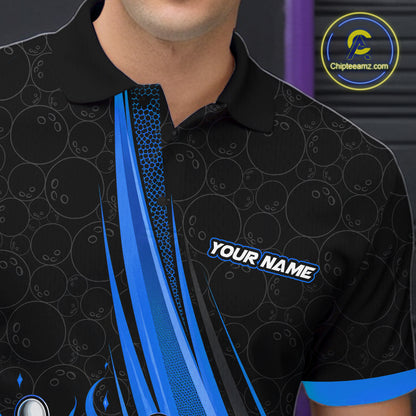 A close-up of a man wearing a black short-sleeve polo shirt with blue and gray bowling-themed graphics, including bowling pins, balls, and a diagonal blue stripe. The shirt has a customizable text