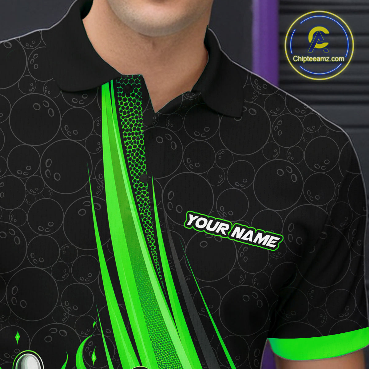 A close-up of a man wearing a black polo shirt with a green bowling-themed pattern, featuring a green vertical stripe design, a green collar trim, and a customizable name 