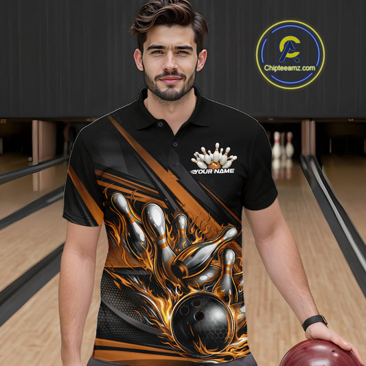 Male model in a bowling lane wearing a black polo shirt, front view featuring gold flame bowling ball hitting pins with dynamic stripe artwork