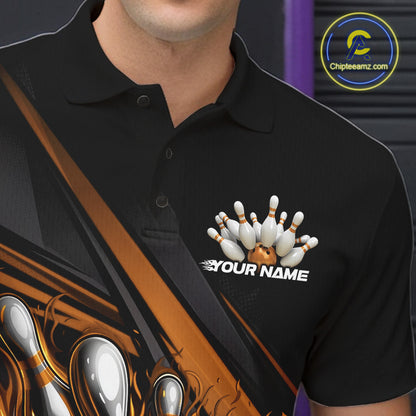Close-up left chest detail of black bowling polo shirt featuring gold flame bowling ball and pins emblem with geometric stripe accents
