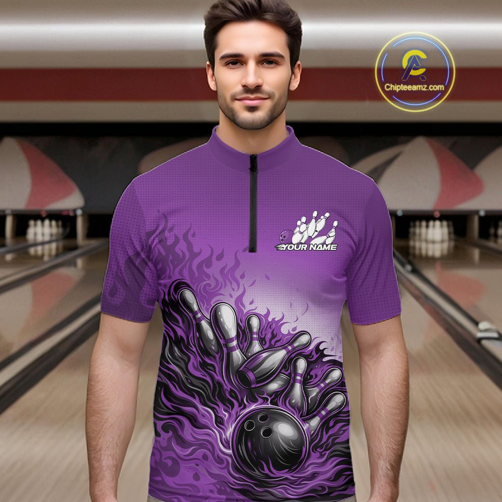 Male model in a bowling lane wearing a purple quarter-zip shirt, flame bowling strike artwork with bold energetic motion.