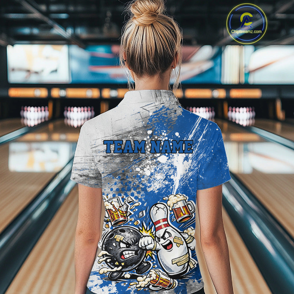 Back view of a female model in a bowling lane wearing a blue and white grunge splatter polo shirt featuring playful cartoon bowling action design.