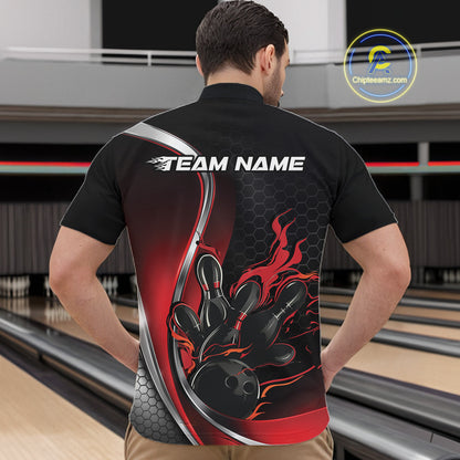 Male model front view in bowling alley wearing black and red quarter zip shirt featuring flaming bowling ball striking pins dynamic artwork