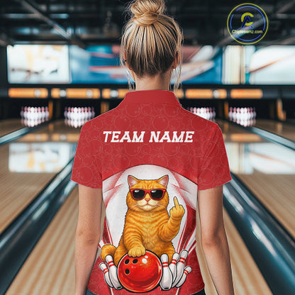 Back view of a female model in a bowling venue wearing a bowling polo shirt featuring a British Shorthair cat in sunglasses beside a bowling ball.