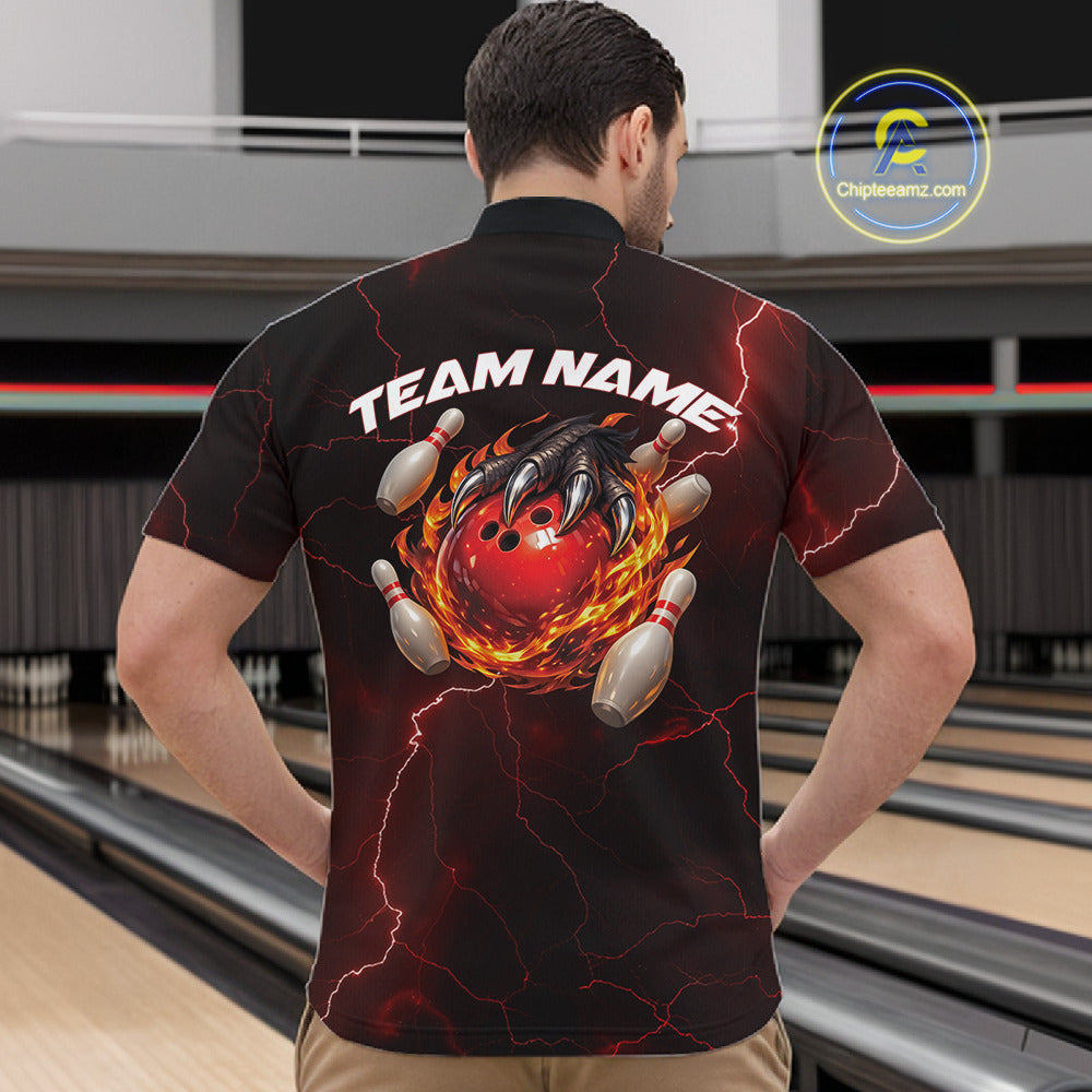 Front view of a black and red mens bowling quarter-zip displaying a flaming bowling ball held by a dragon claw.