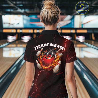 Back view of a black and red womens quarter-zip displaying fiery dragon claw and bowling ball graphics.