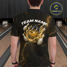 Load image into Gallery viewer, Back view of a black and yellow mens bowling polo showcasing a dragon claw holding a flaming bowling ball with bowling pins.