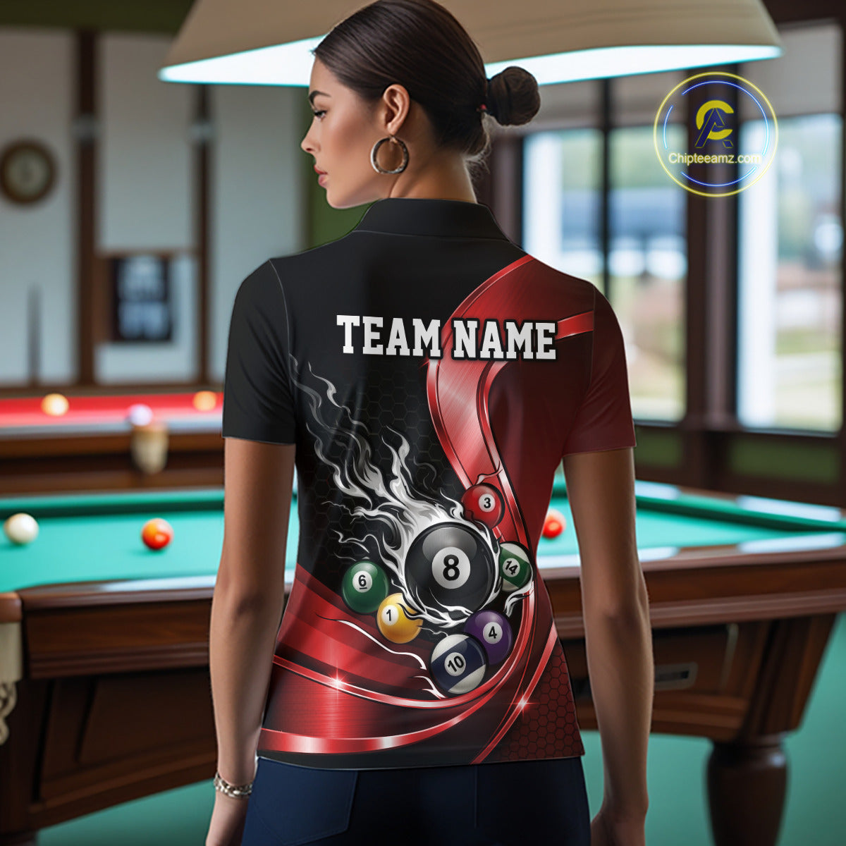 Back view of a female model in a black and red billiard polo with metallic ribbons, honeycomb artwork, and scattered pool balls