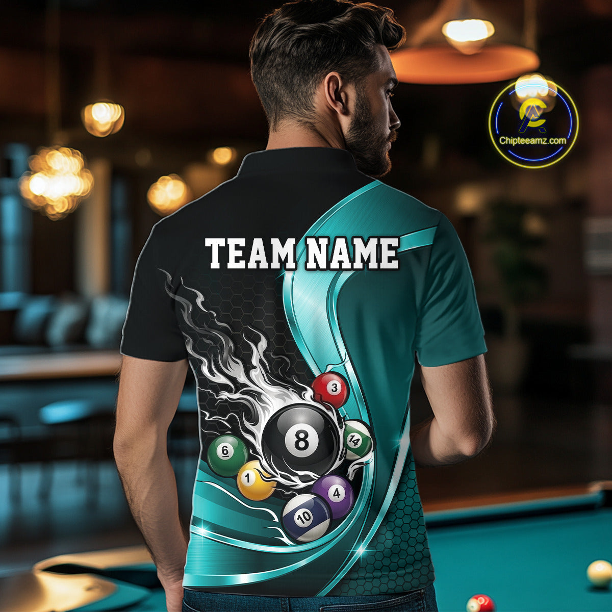 Back view of a male model wearing a black and blue billiard polo with metallic ribbons, dark honeycomb artwork, and a flaming 8-ball
