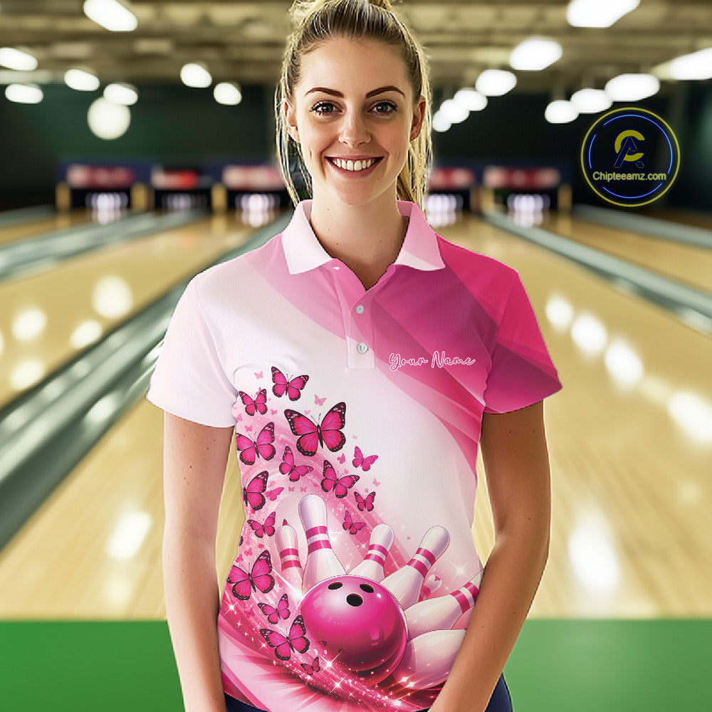 Front view of a female model in a white and pink bowling polo featuring butterfly graphics and colorful bowling artwork