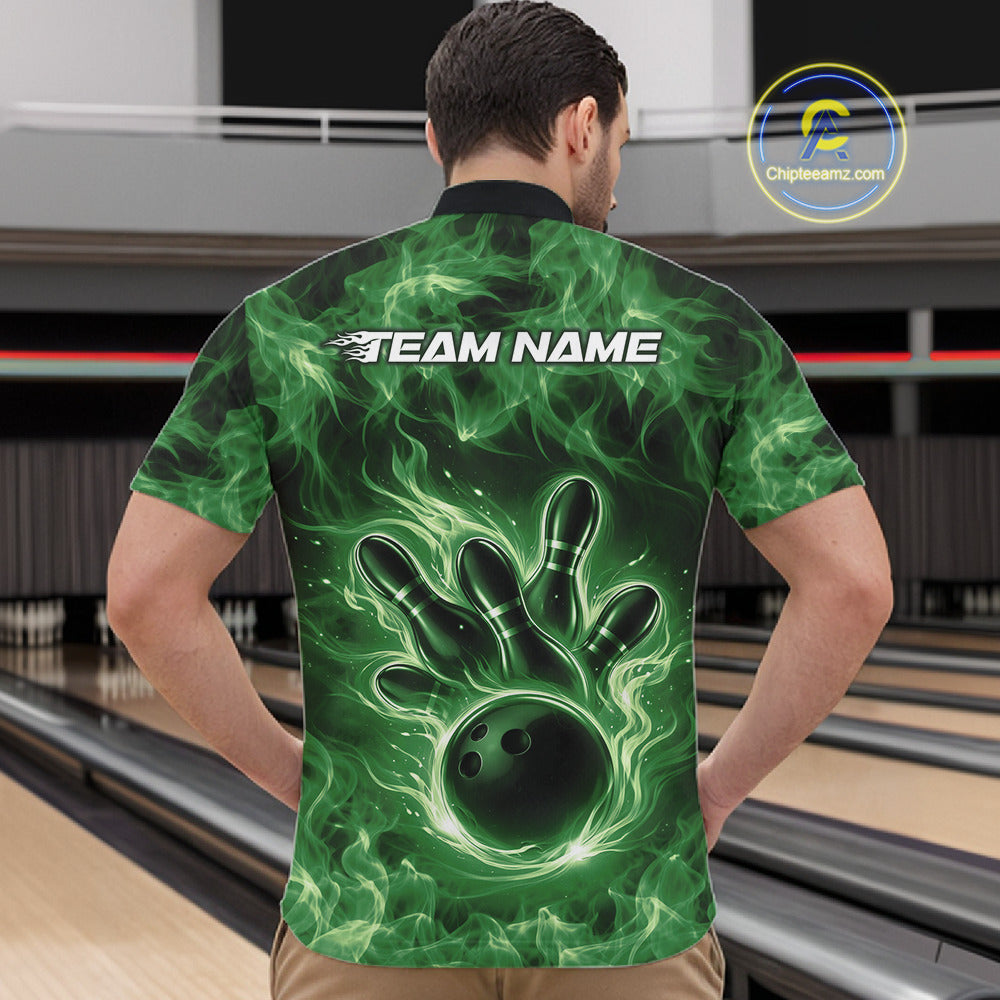 Front view of a green mens quarter-zip showcasing a bowling ball surrounded by dramatic flames.