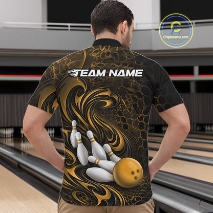 Male model wearing a black and yellow bowling quarter-zip shirt in a bowling alley featuring a tribal flame bowling ball and pins graphic
