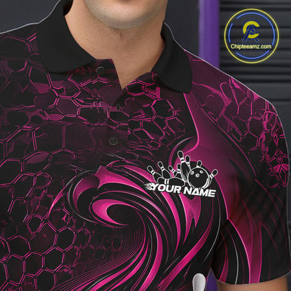 Close-up of the left chest on a black and pink bowling polo shirt showing a tribal flame design with a bowling ball and pins.