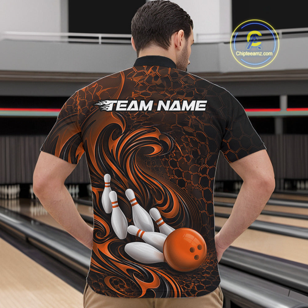Male model wearing a black and orange bowling quarter-zip shirt in a bowling alley featuring a tribal flame bowling ball and pins graphic