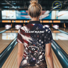Load image into Gallery viewer, Back view of a female model inside a bowling center wearing a bowling quarter-zip shirt with a raccoon in patriotic sunglasses rolling a bowling ball through scattered pins against a distressed American flag backdrop.