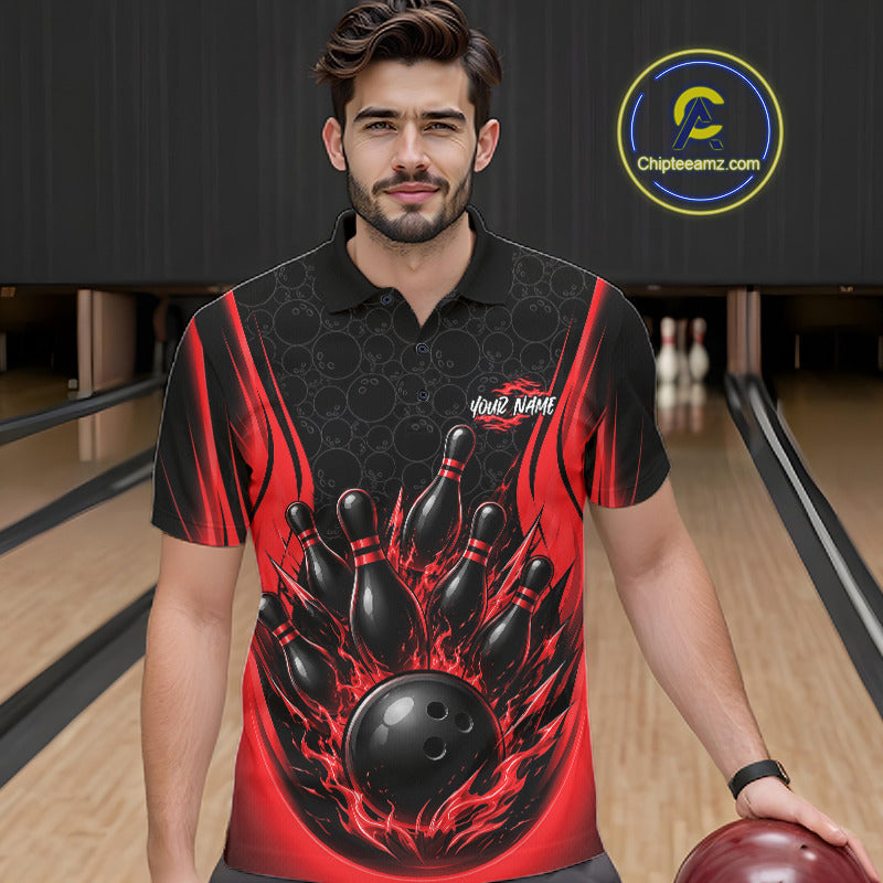 A man wearing a black and red bowling-themed short-sleeve polo shirt with a graphic of bowling pins and a bowling ball, standing in a bowling alley. 