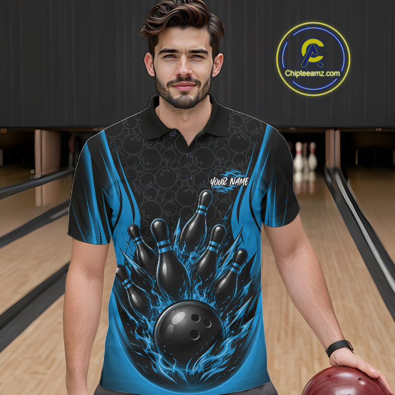 A man wearing a custom bowling-themed polo shirt with a graphic of bowling pins and a bowling ball on a blue and black flame pattern, standing in a bowling alley.