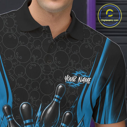 A close-up of a black short-sleeve polo shirt with a bowling-themed graphic print, featuring bowling pins, bowling balls, blue flame-like stripes, and a customizable name 
