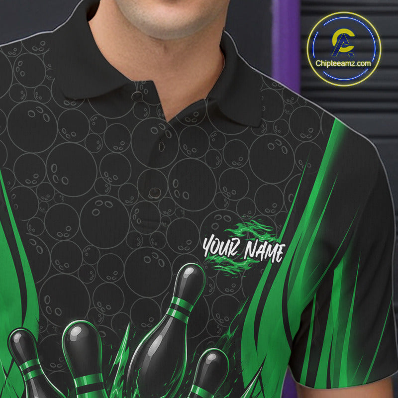 A close-up of a person wearing a black short-sleeve polo shirt with a bowling-themed graphic print. 
