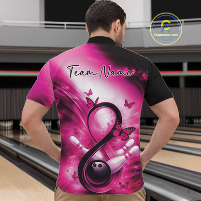 Male model wearing a bowling quarter-zip shirt in a bowling lane featuring a pink awareness ribbon around a bowling ball with pins and butterflies.