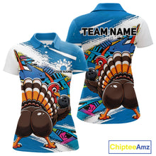 Load image into Gallery viewer, Front and back views of a blue custom women's bowling polo shirt featuring a funny graffiti turkey holding a bowling ball, paint splatter accents, and a personalized name.