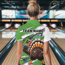 Load image into Gallery viewer, Back view of a female model in a bowling alley wearing a green custom quarter zip bowling shirt with a funny graffiti turkey holding a bowling ball, paint splatter accents, and a personalized name.