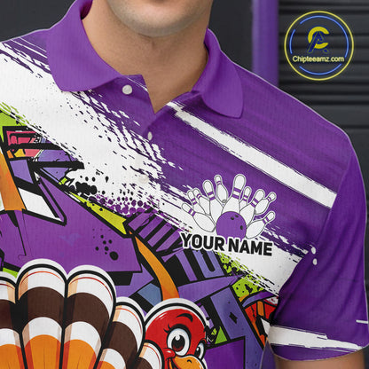 Close up front view of the left chest area on a purple custom bowling polo shirt, featuring a graffiti inspired urban street style design with paint splatter accents and a personalized name.