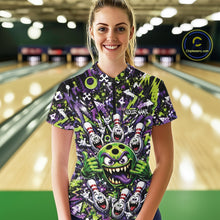 Load image into Gallery viewer, Front view of a female model at a bowling lane wearing a green and purple bowling quarter-zip shirt featuring a mischievous green monster bowling ball with sharp teeth, a purple tongue, playful hand gesture, and cheerful cartoon bowling pins.