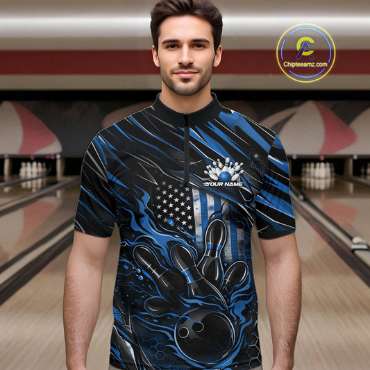 Male model wearing a black and blue bowling quarter-zip shirt at a bowling lane with fiery bowling strike graphics and patriotic accents.