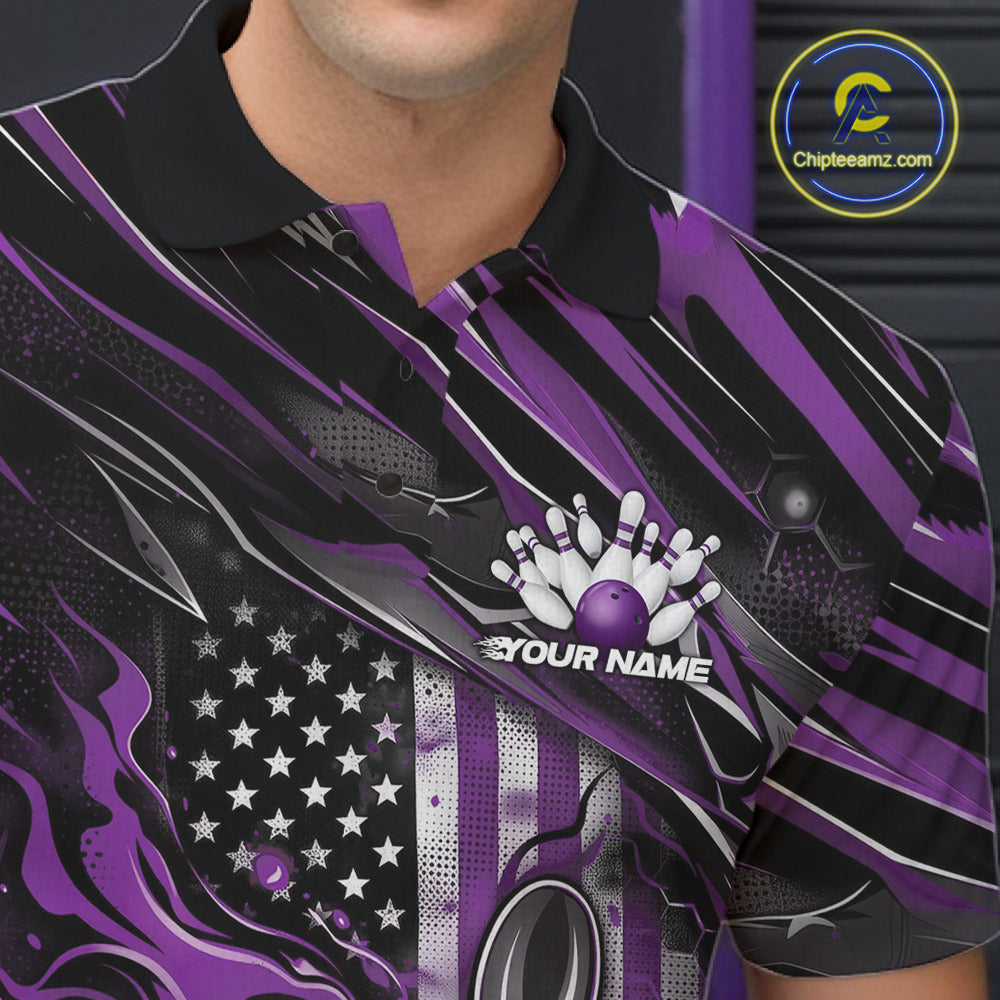 Close-up of the left chest area on a black and purple bowling polo shirt featuring a patriotic bowling strike graphic with flame effects.