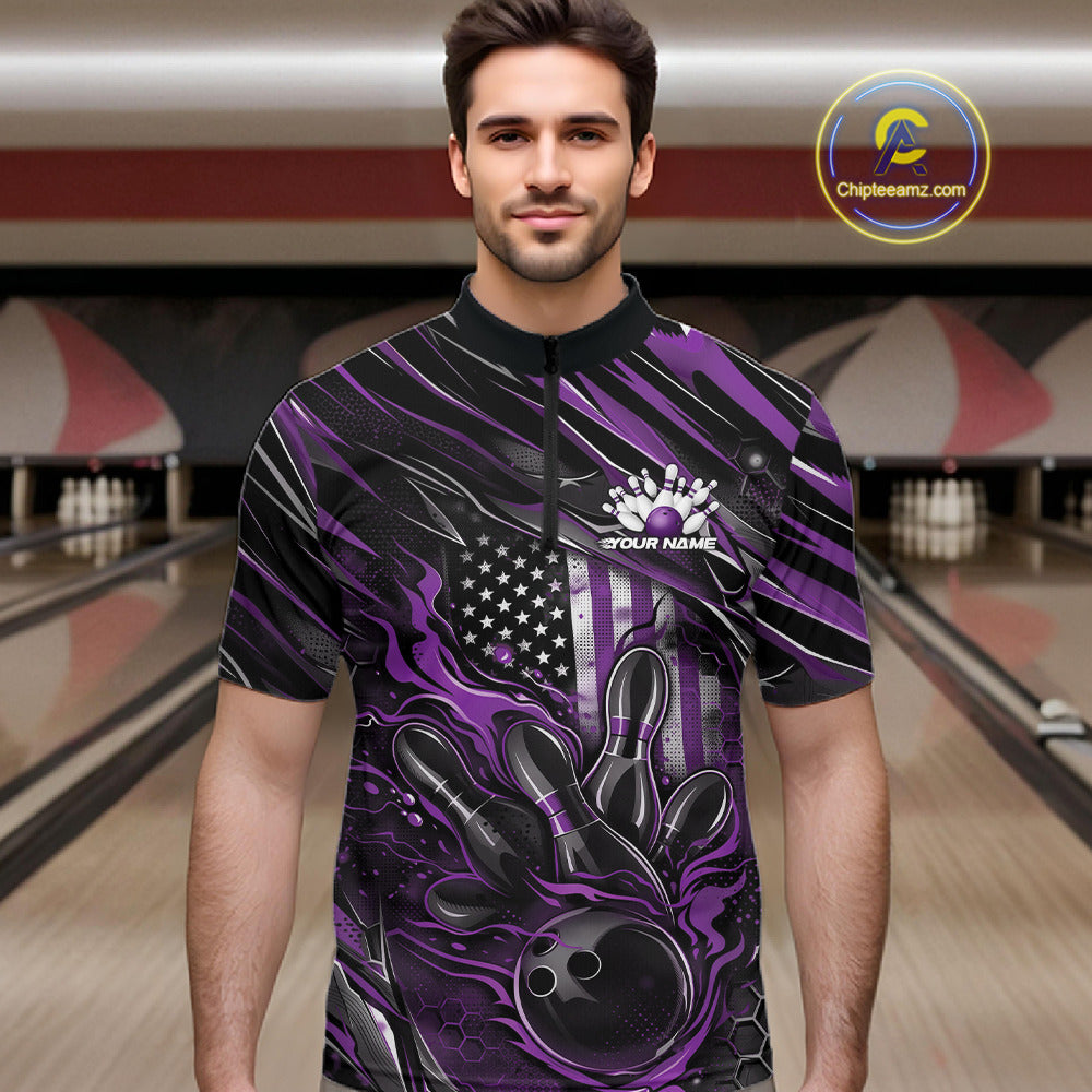 Male model at a bowling lane wearing a black and purple bowling quarter-zip shirt with fiery bowling action artwork and patriotic details.