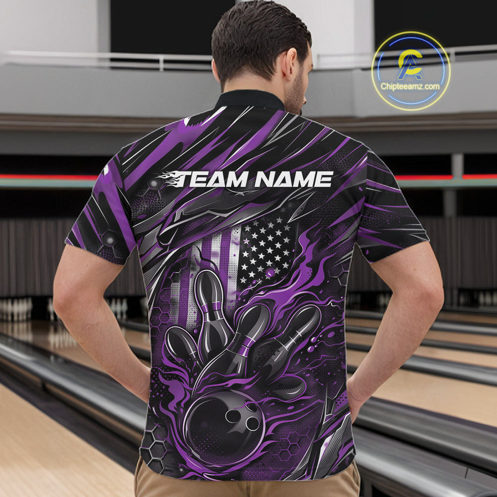 Front view of a male model in a bowling venue wearing a black and purple quarter-zip shirt featuring a bowling strike graphic with flame effects.