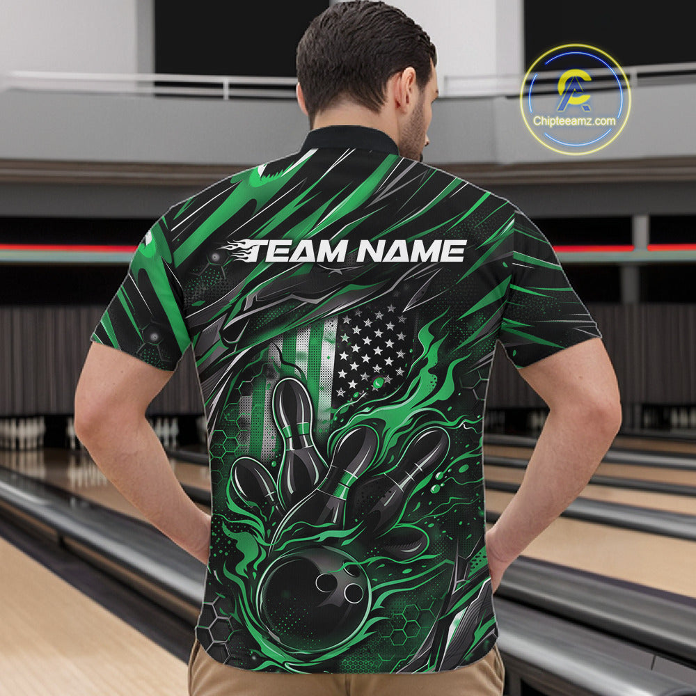 Front view of a male model in a bowling center wearing a black and green quarter-zip shirt featuring a flaming bowling ball and pin design.