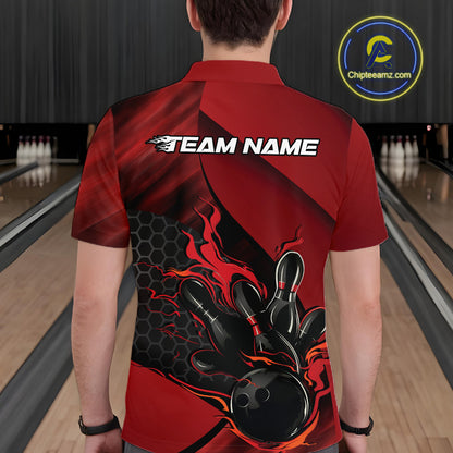Close-up of the left chest area on a black and red bowling polo shirt featuring a flaming bowling strike design with hexagon details.