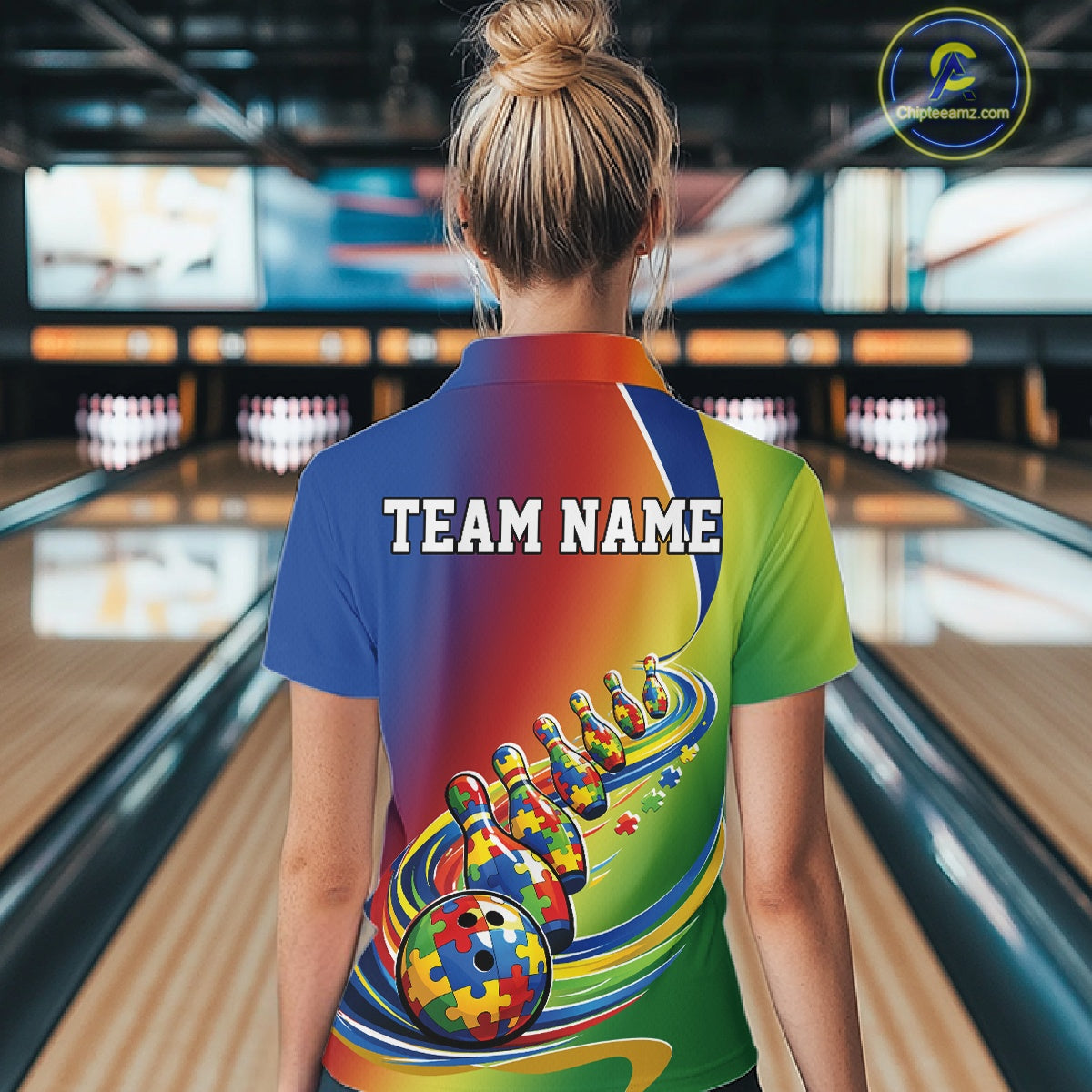 Back view of a female model in a bowling lane wearing a colorful quarter-zip shirt, autism puzzle bowling ball design with trailing matching bowling pins in vibrant illustration style.