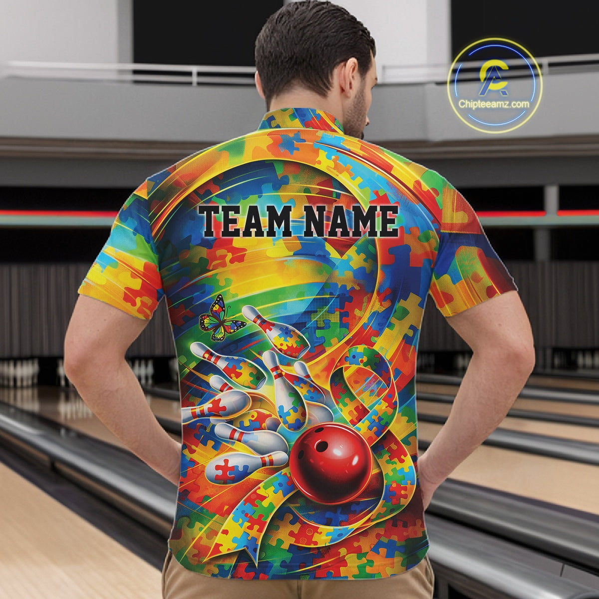 Male model in a bowling lane wearing a colorful quarter-zip shirt, puzzle-themed autism bowling strike illustration with bright dynamic design.