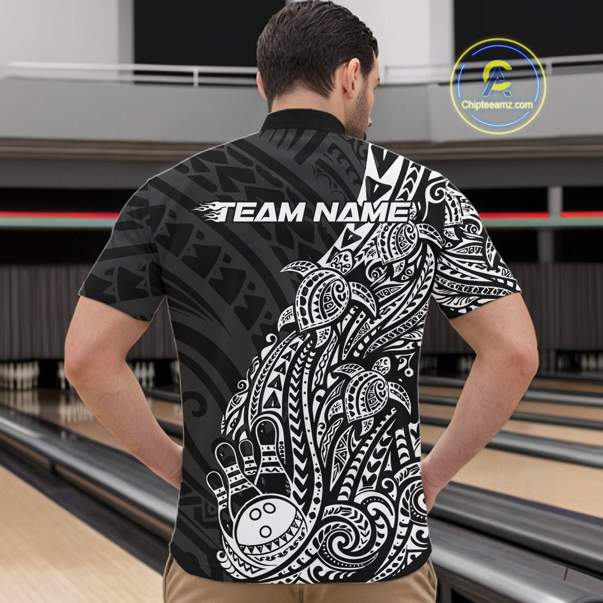 Front view of a male model in a black and white bowling quarter-zip shirt displaying tribal swirl bowling graphics.