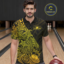 Load image into Gallery viewer, Male model wearing a black and gold bowling polo shirt at the bowling lane with tribal-inspired bowling motifs.