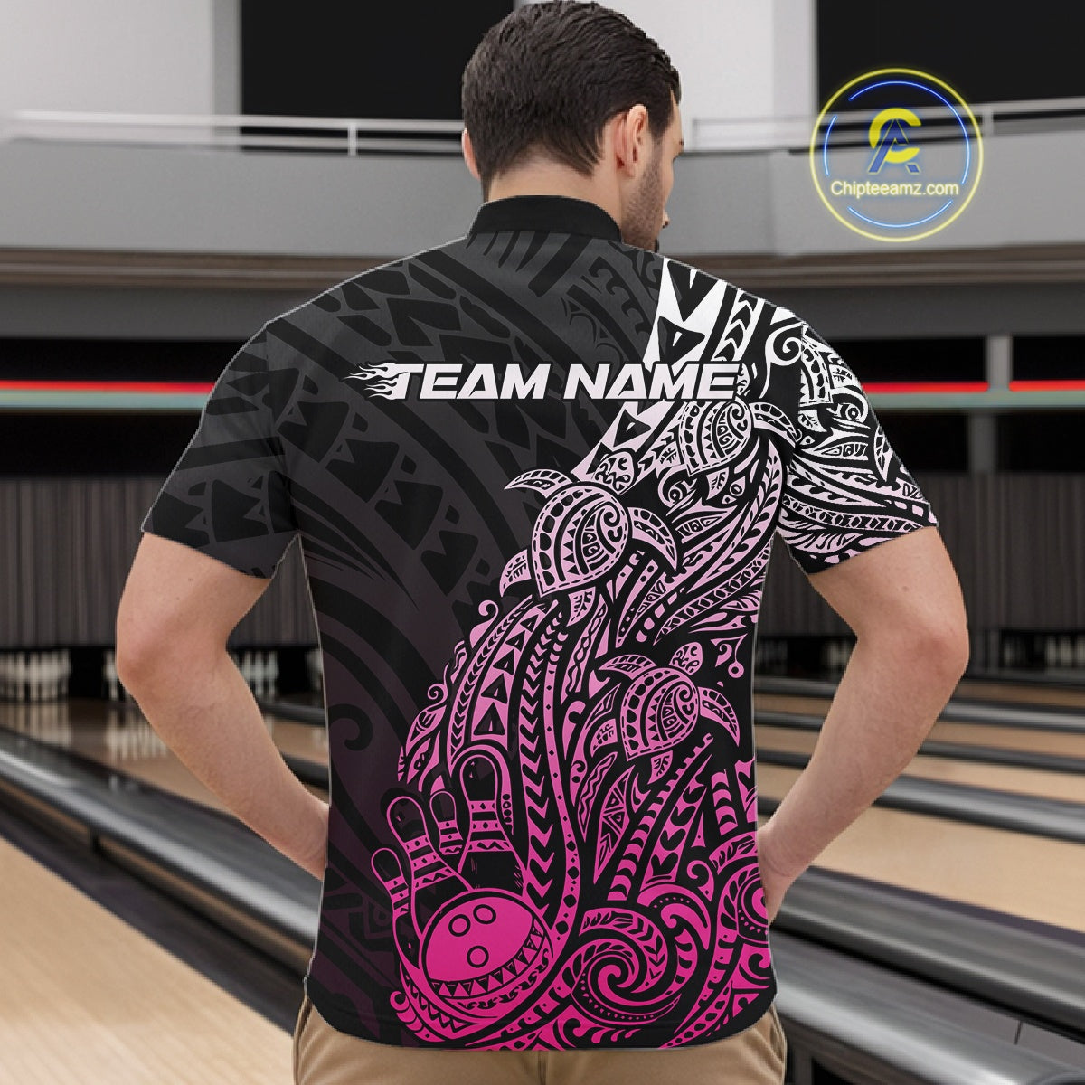 Front view of a male model in a black and pink bowling quarter-zip shirt featuring turtle-themed tribal bowling artwork.