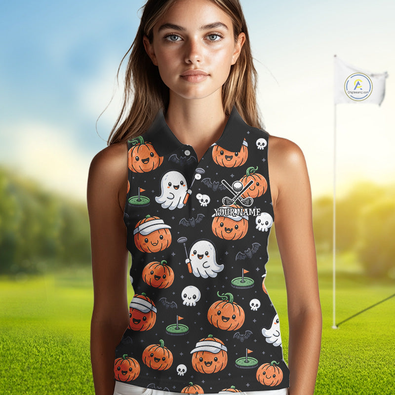 A woman modeling a sleeveless black polo golf shirt with a Halloween print of pumpkins, ghosts, skulls, and golf balls on a blurred green golf course background.
