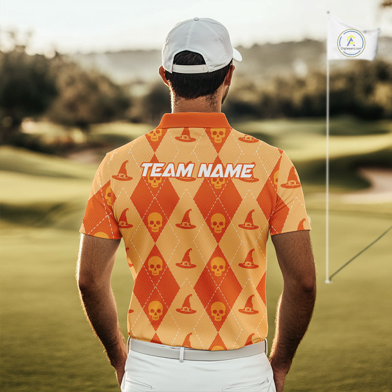 A man viewed from behind wearing a short-sleeve polo shirt on a golf course. The shirt has an orange and yellow argyle pattern with skull and hat motifs, and 'TEAM NAME' printed across the upper back.